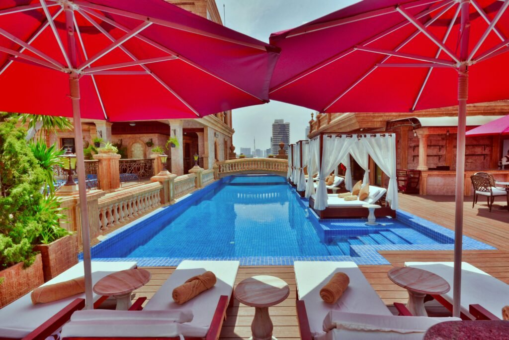 Experience tranquility at this luxurious rooftop pool in Phnom Penh, Cambodia, perfect for relaxation and sunbathing.